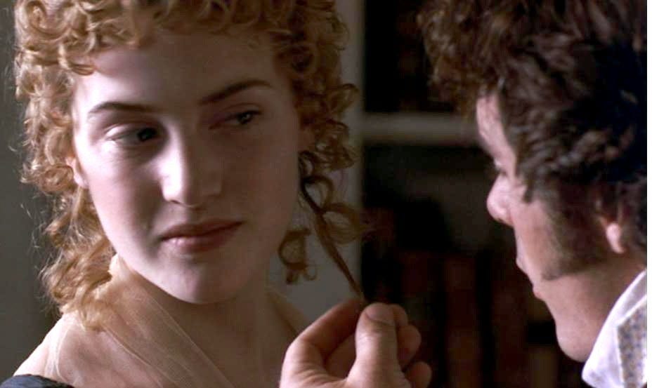 Mr. Willoughby admiring and cutting a lock of Marianne Dashwood's hair. 