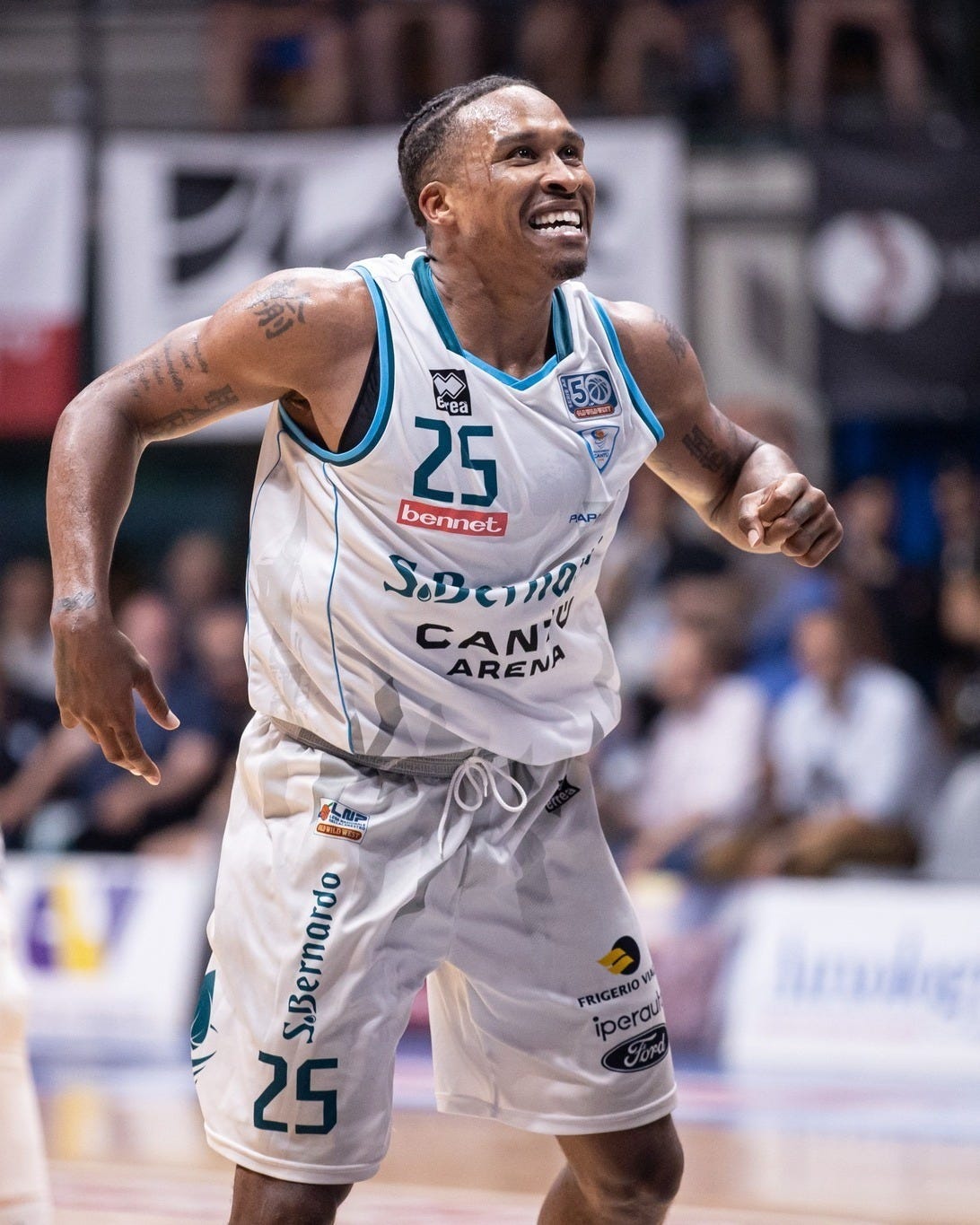 May be an image of 1 person, playing basketball and text that says '50 Erea /Ca 25 bennet SABCInO" SoBe CANU CAN ARENA 型定 D S.Bernardo 25 FRIGERIO VIA iperou lnuág' May be an image of 1 person, playing basketball and text that says '50 Erea /Ca 25 bennet SABCInO" SoBe CANU CAN ARENA 型定 D S.Bernardo 25 FRIGERIO VIA iperou lnuág'