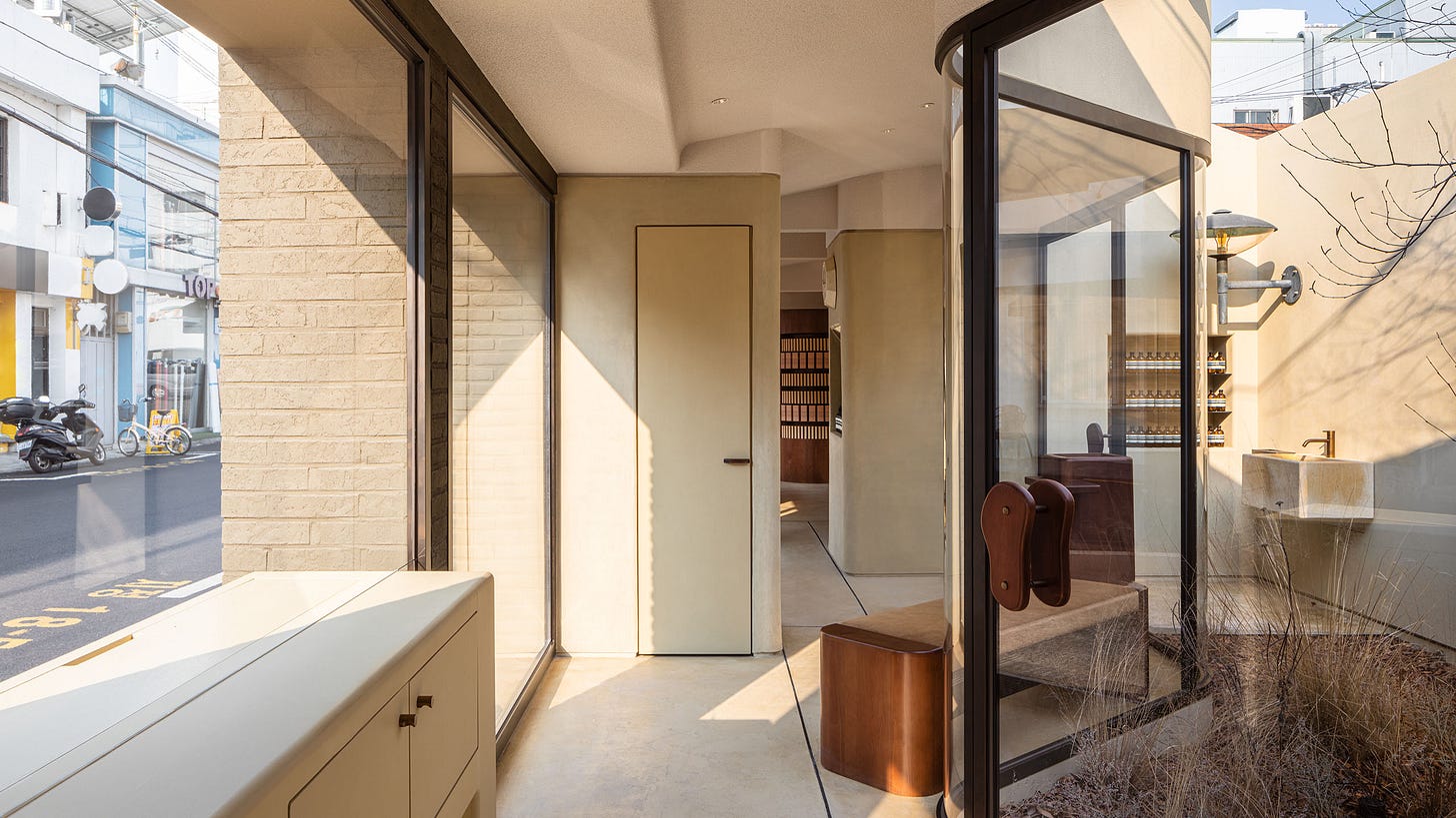 A view through Aesop Seongsu, with the streetfront to the left, and inner-courtyard to the right.