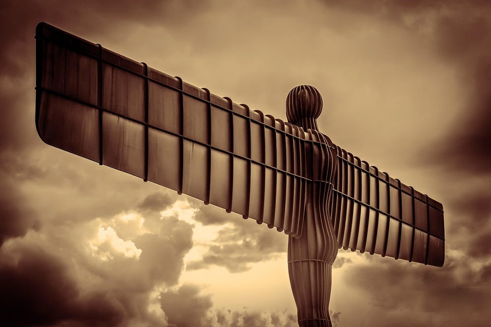 image depicts the Angel of the North sculpture as seen from the rear. image depicts the Angel of the North sculpture as seen from the rear.