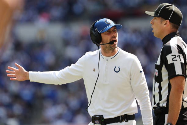 Head coach Shane Steichen of the Indianapolis Colts argues a call with side judge Jeff Lamberth during the third quarter against the Houston Texans...