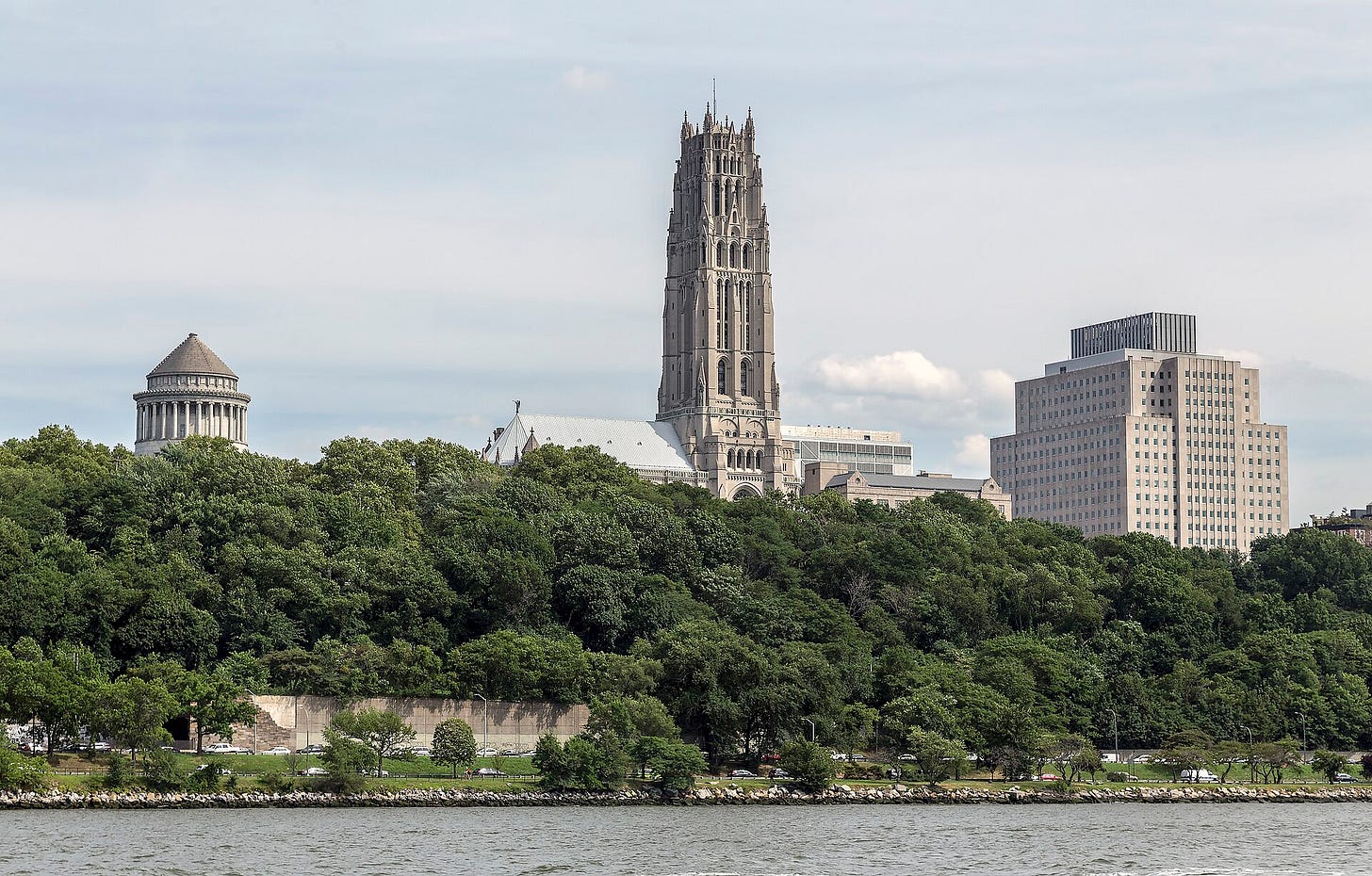 A landscape of Riverside Park; behind the park's trees is the tower of Riverside Church, at center A landscape of Riverside Park; behind the park's trees is the tower of Riverside Church, at center