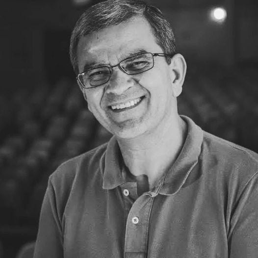 May be a black-and-white image of 1 person and eyeglasses May be a black-and-white image of 1 person and eyeglasses