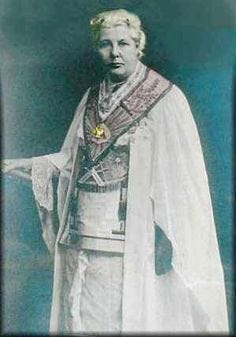 This may contain: an old photo of a man dressed in white This may contain: an old photo of a man dressed in white