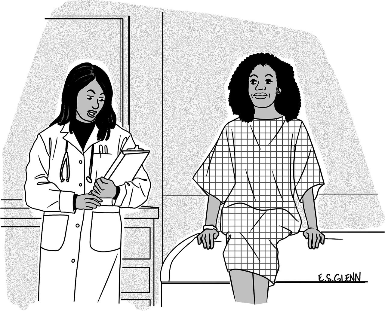 Doctor speaking to patient in exam room.
