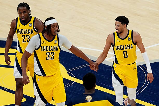 Myles Turner and Tyrese Haliburton of the Indiana Pacers react during the third quarter against the Oklahoma City Thunder in Game Six of the 2025 NBA...