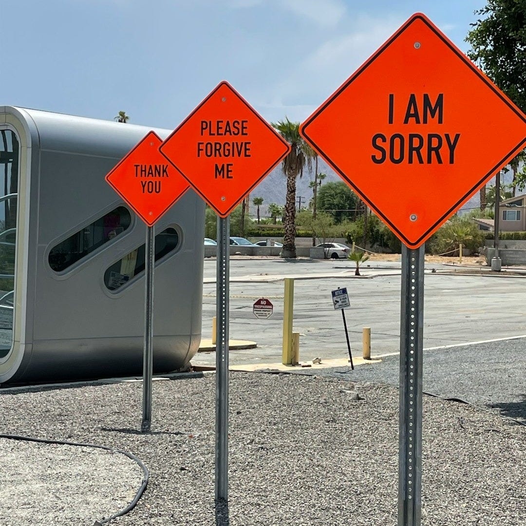 white and red street sign