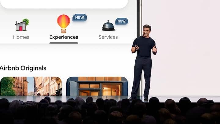 CEO Brian Chesky on stage announcing the launch of Airbnb Services, Airbnb Experiences, and the redesigned Airbnb app.