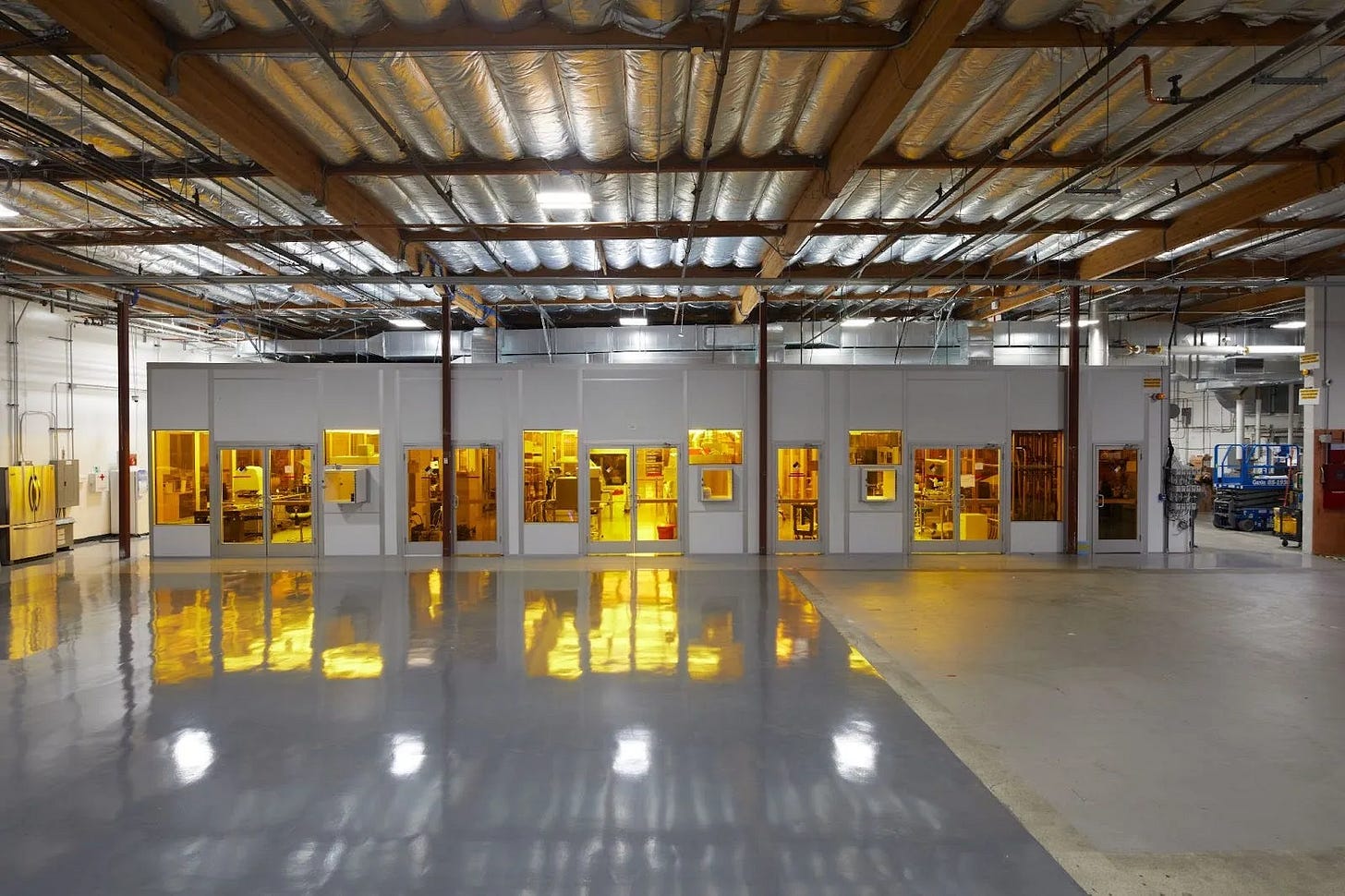 Fab-1 is a captive quantum integrated circuit foundry. We combine modern silicon semiconductor and MEMS processing technologies with novel manufacturing methods to produce state-of-the-art superconducting qubits and device layers for microwave circuitry. Our process flows leverage superconducting materials such as aluminum, indium, and niobium in a series of subtractive patterning, etching, lithography, and deposition processes that result in ultra-low-loss superconducting devices. We incorporate best practices from industrial and research fabs to maintain a stable process of record while also running continuous shortloop development tests to optimize for fast learning cycles.