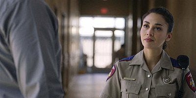 Walker Micki smiling at James. Walker Micki smiling at James.