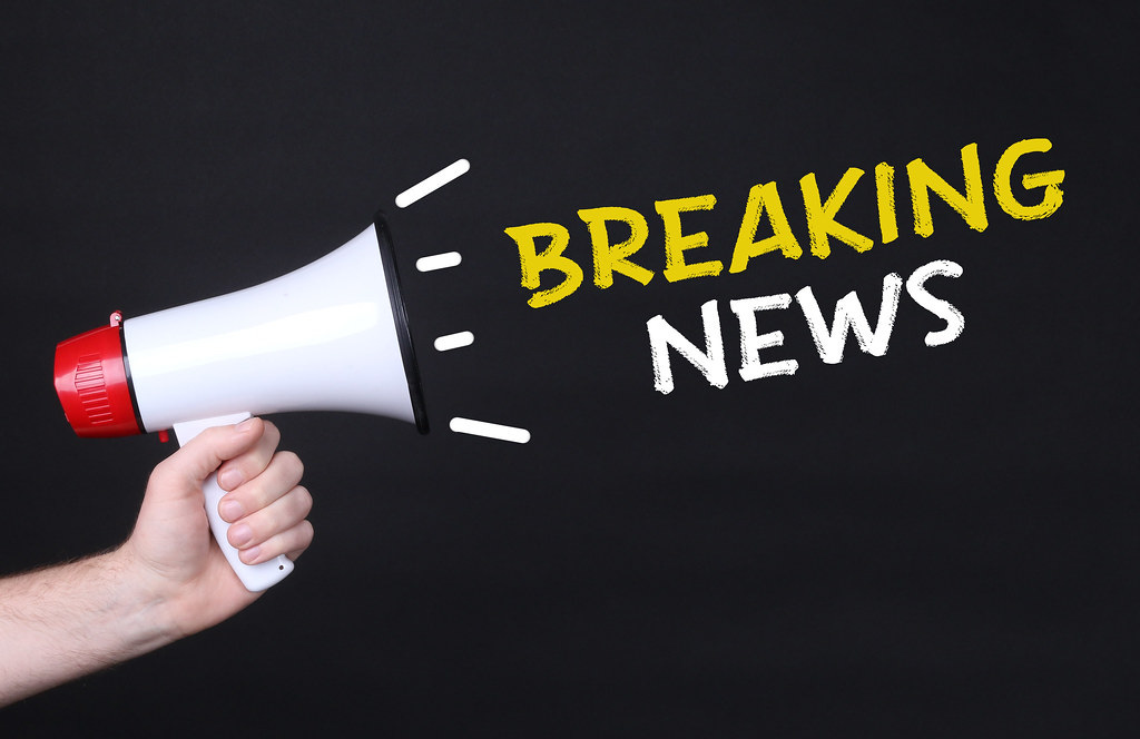 Breaking News hand-drawn text and hand holding megaphone | Flickr