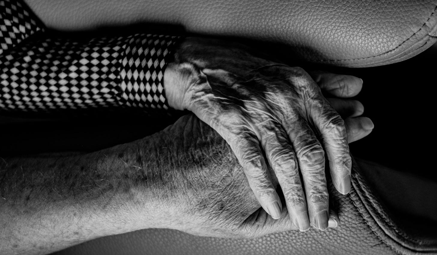 grayscale photograph of elderly human hands, holding hands grayscale photograph of elderly human hands, holding hands