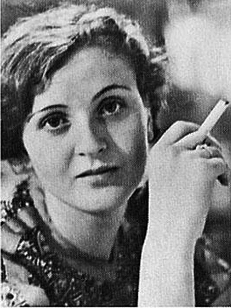 Gretl Braun, Eva's sister, discreetly enjoying a cigarette, a habit discouraged in Nazi Germany. Gretl Braun, Eva's sister, discreetly enjoying a cigarette, a habit discouraged in Nazi Germany.