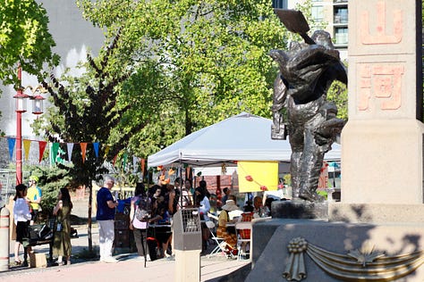 People at the Chinatown Memorial Plaza