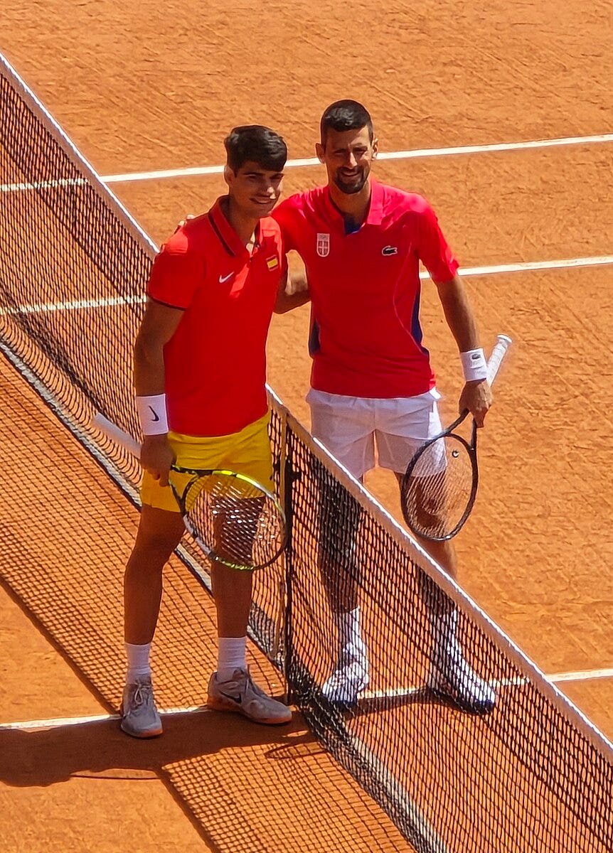 "Novak Djokovic vs. Carlos Alcaraz, 2024 Summer Olympics men's singles tennis tournament, 2024-08-04 (47) (cropped)" by Like tears in rain is licensed under CC BY-SA 4.0.