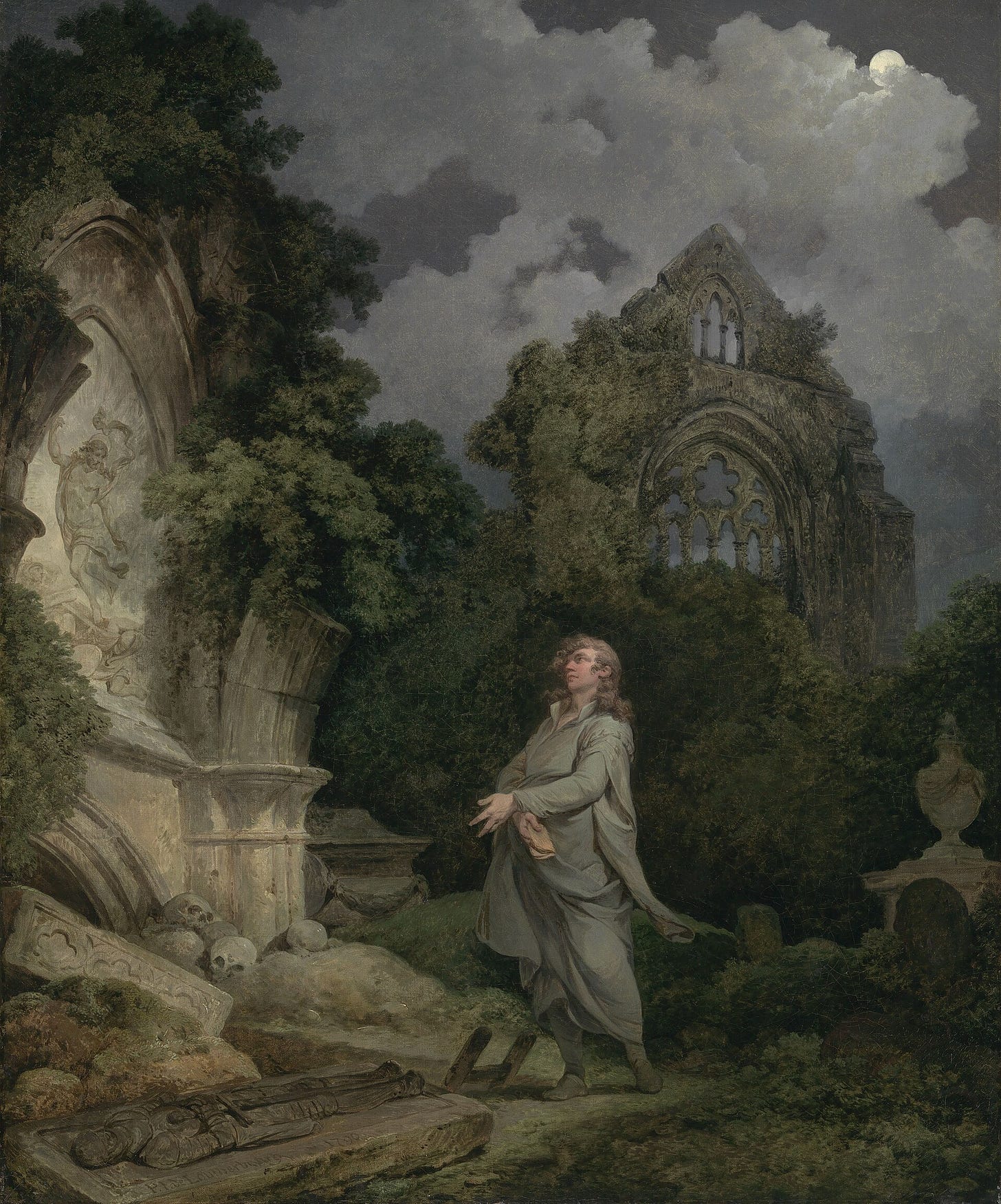 A young man in a long pale coat stands in a ruined Gothic abbey by night, looking up toward the moon, beside a broken tomb with skulls lying on the ground. A young man in a long pale coat stands in a ruined Gothic abbey by night, looking up toward the moon, beside a broken tomb with skulls lying on the ground.