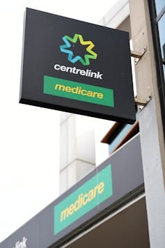 Centrelink signage seen from below Centrelink signage seen from below