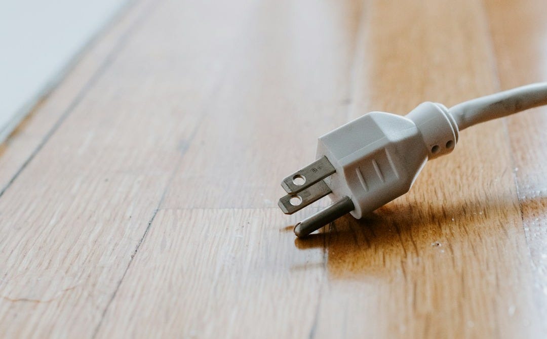 white usb cable on brown wooden table white usb cable on brown wooden table