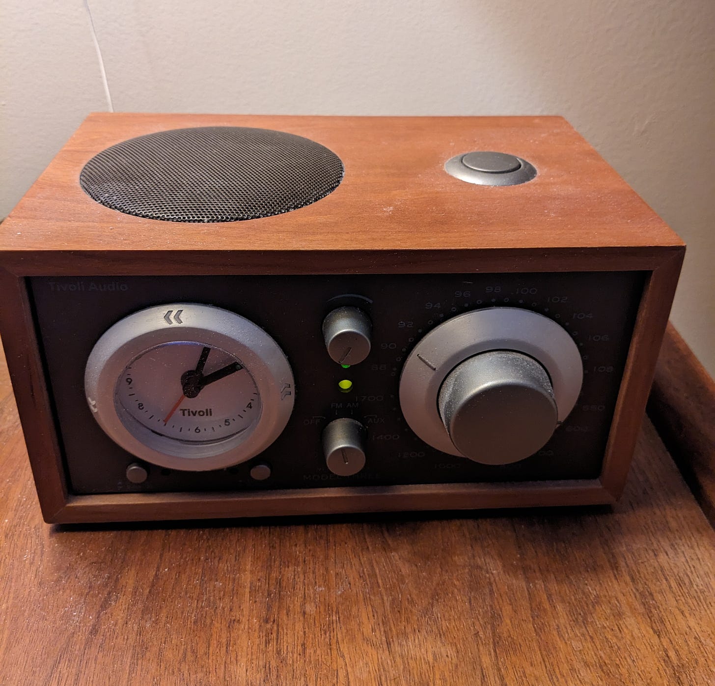 Small wooden radio with dials