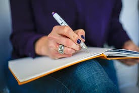 Woman Writing Notebook Free Stock Photo - NegativeSpace