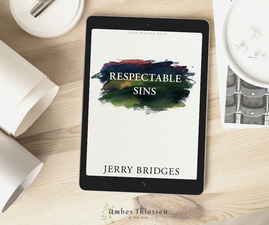 book cover Respectable Sins by Jerry Bridges on wood desk 