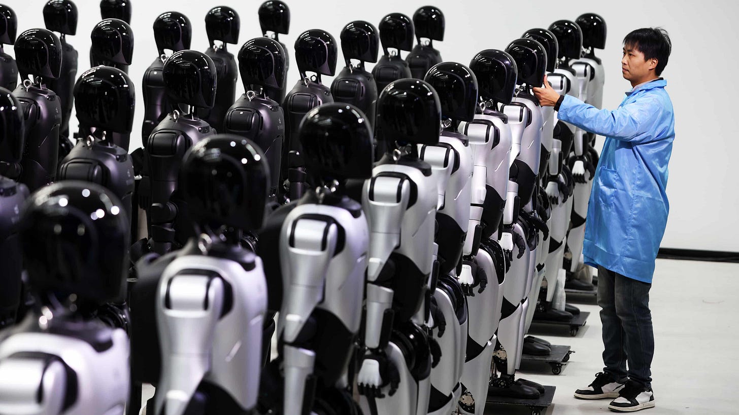 An engineer at the AgiBot factory in Shanghai, China, where the 5,000th mass-produced humanoid robot had rolled off the production line. An engineer at the AgiBot factory in Shanghai, China, where the 5,000th mass-produced humanoid robot had rolled off the production line.