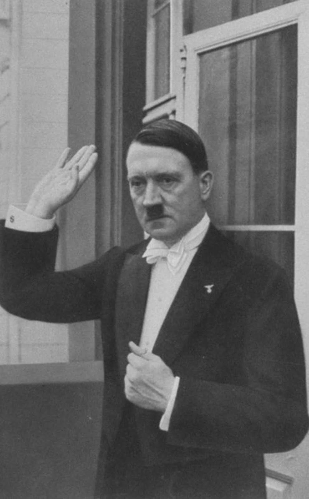 Adolf Hitler wishing guests a happy new year on New Year's Eve 1936. Despite the celebration, Hitler reportedly called Eva Braun shortly after. Adolf Hitler wishing guests a happy new year on New Year's Eve 1936. Despite the celebration, Hitler reportedly called Eva Braun shortly after.