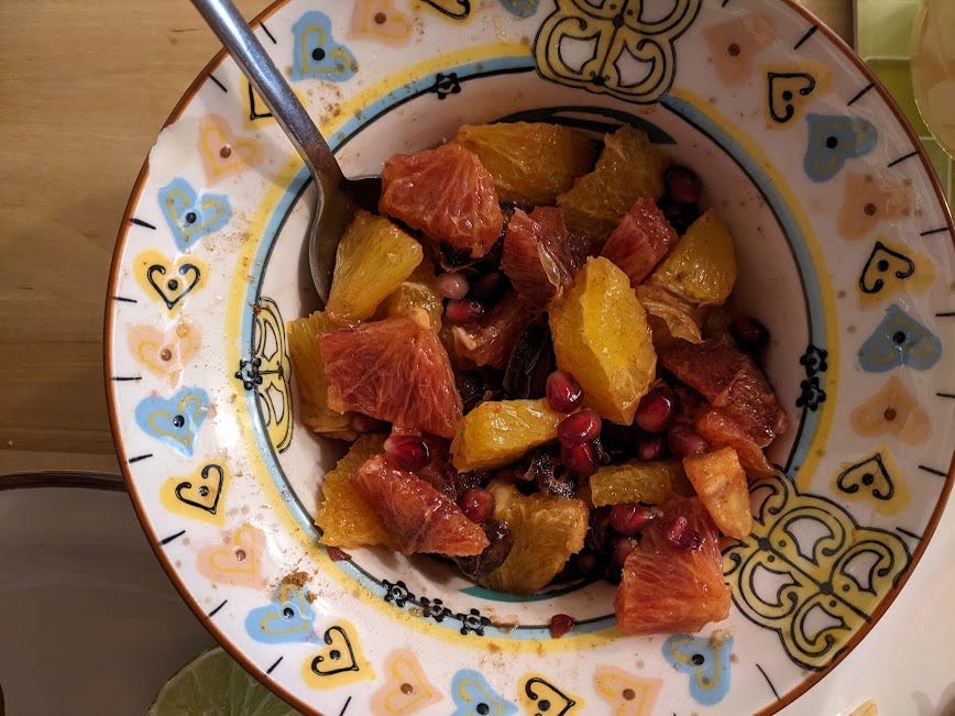 orange date salad in a cute bowl