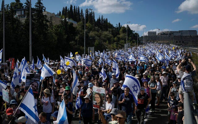 Family and supporters of the some 240 hostages held by Hamas in Gaza on the final leg of a five-day solidarity rally calling for their return, from Tel Aviv to the Prime Minister's Office in Jerusalem, Nov. 18, 2023 (AP Photo/Leo Correa)