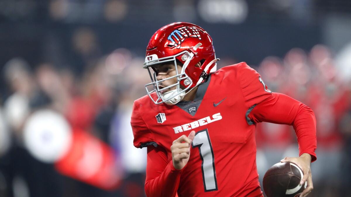 Maiava throws for a TD, runs for 2 more; UNLV beats Wyoming 34-14 - The San  Diego Union-Tribune