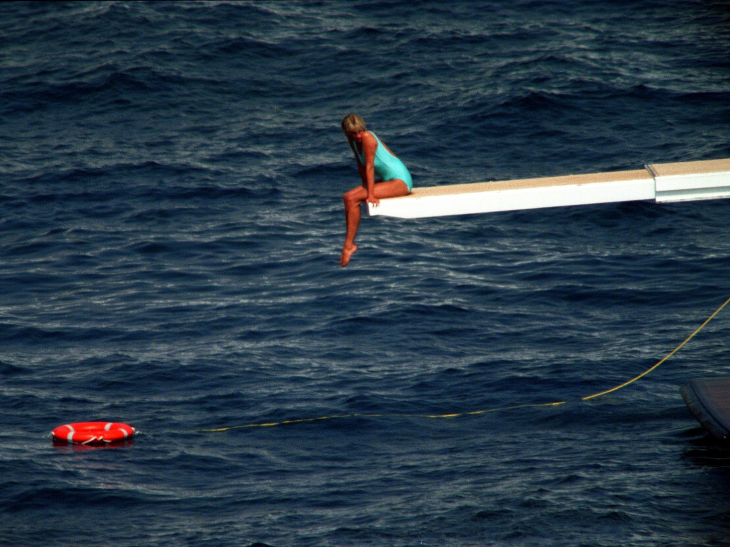 The Harrowing Symbolism Behind the Famous Diving Board Photo of Princess  Diana | Vogue