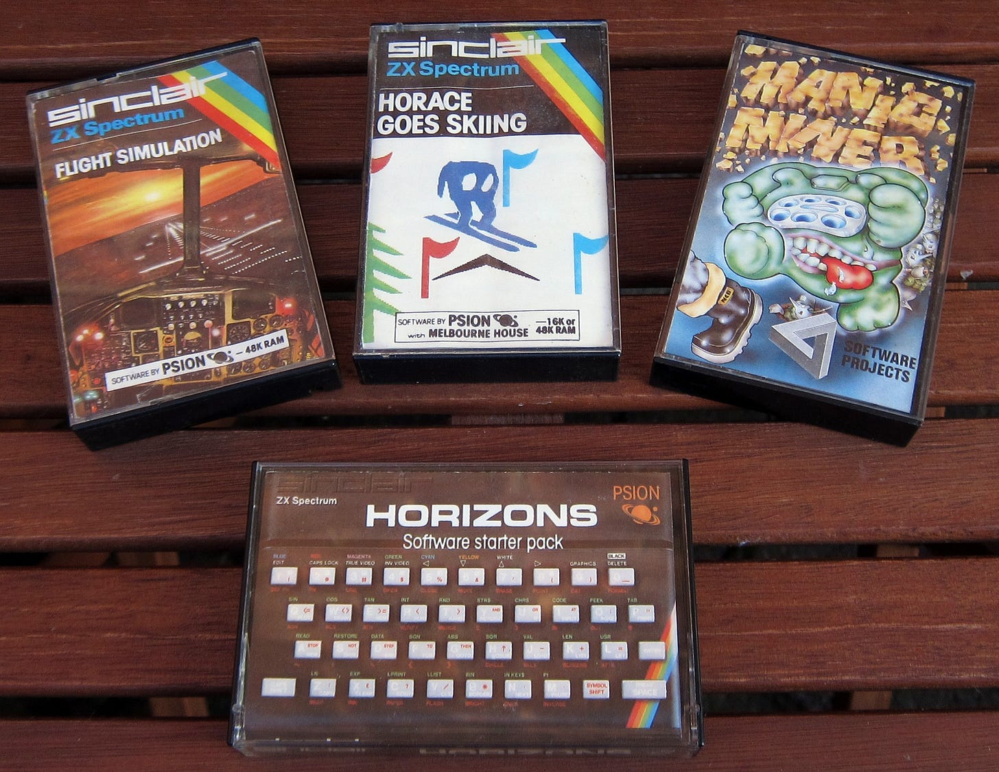 Sinclair ZX Spectrum cassettes: Flight Simulator, Horace Goes Skiing, Manic Miner, and Horizons. 