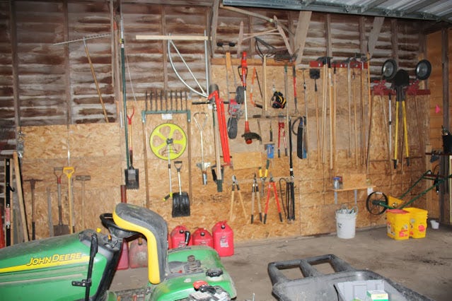 wall of tools in the truck barn