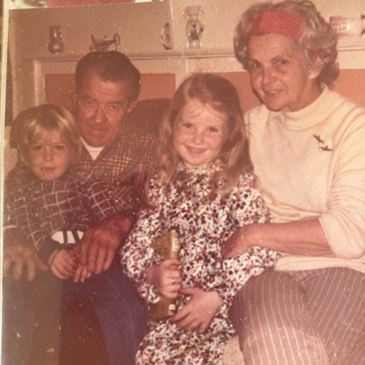 I'm holding a copy of What Katy Did, which still sits on my bookshelf.