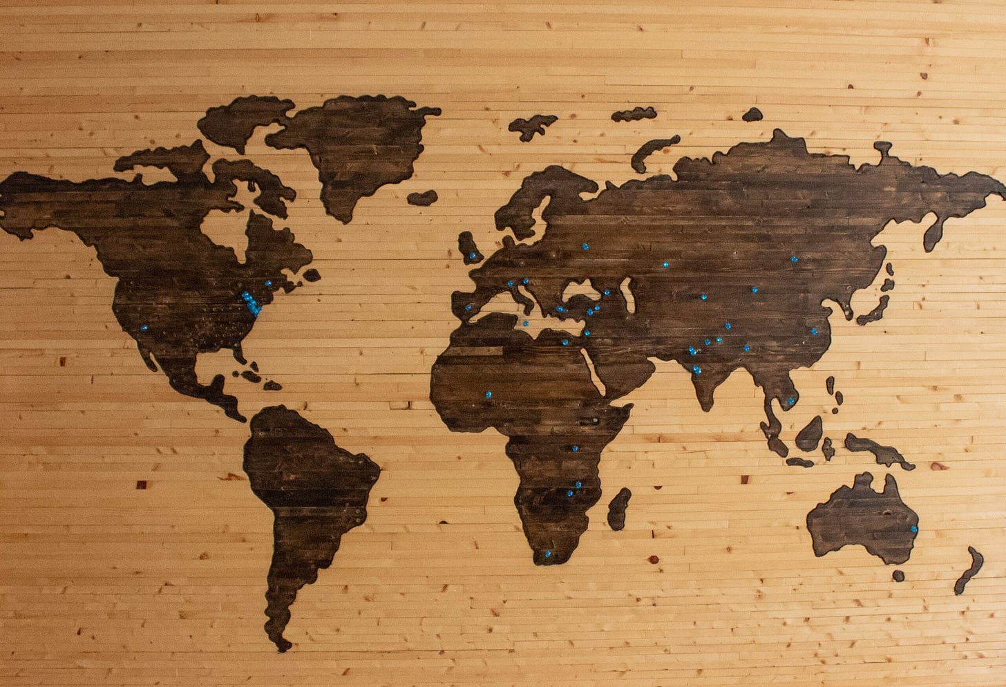 World map on a wooden board World map on a wooden board