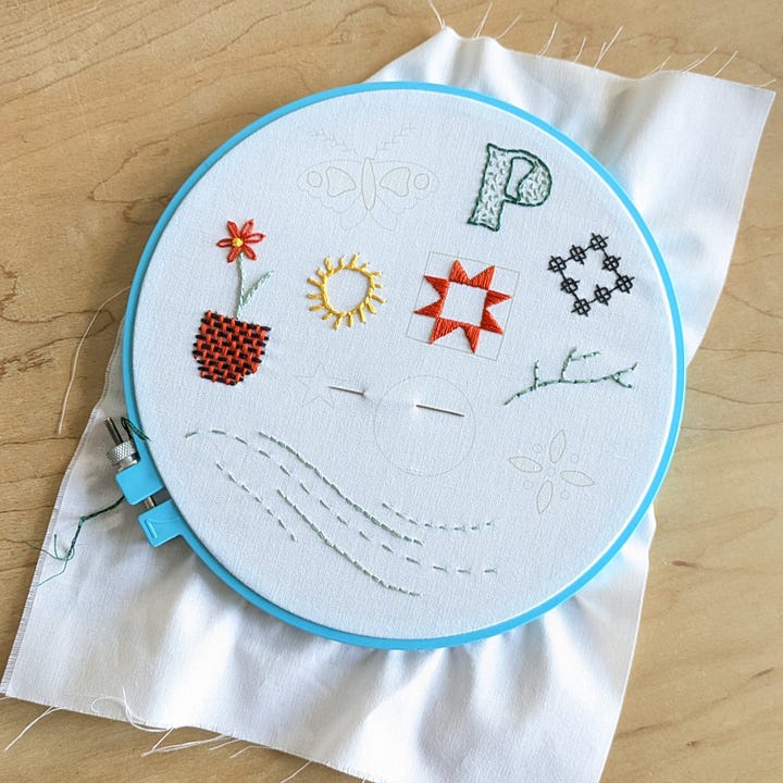 a tote bag, the sampler for our Slow Stitches class in progress