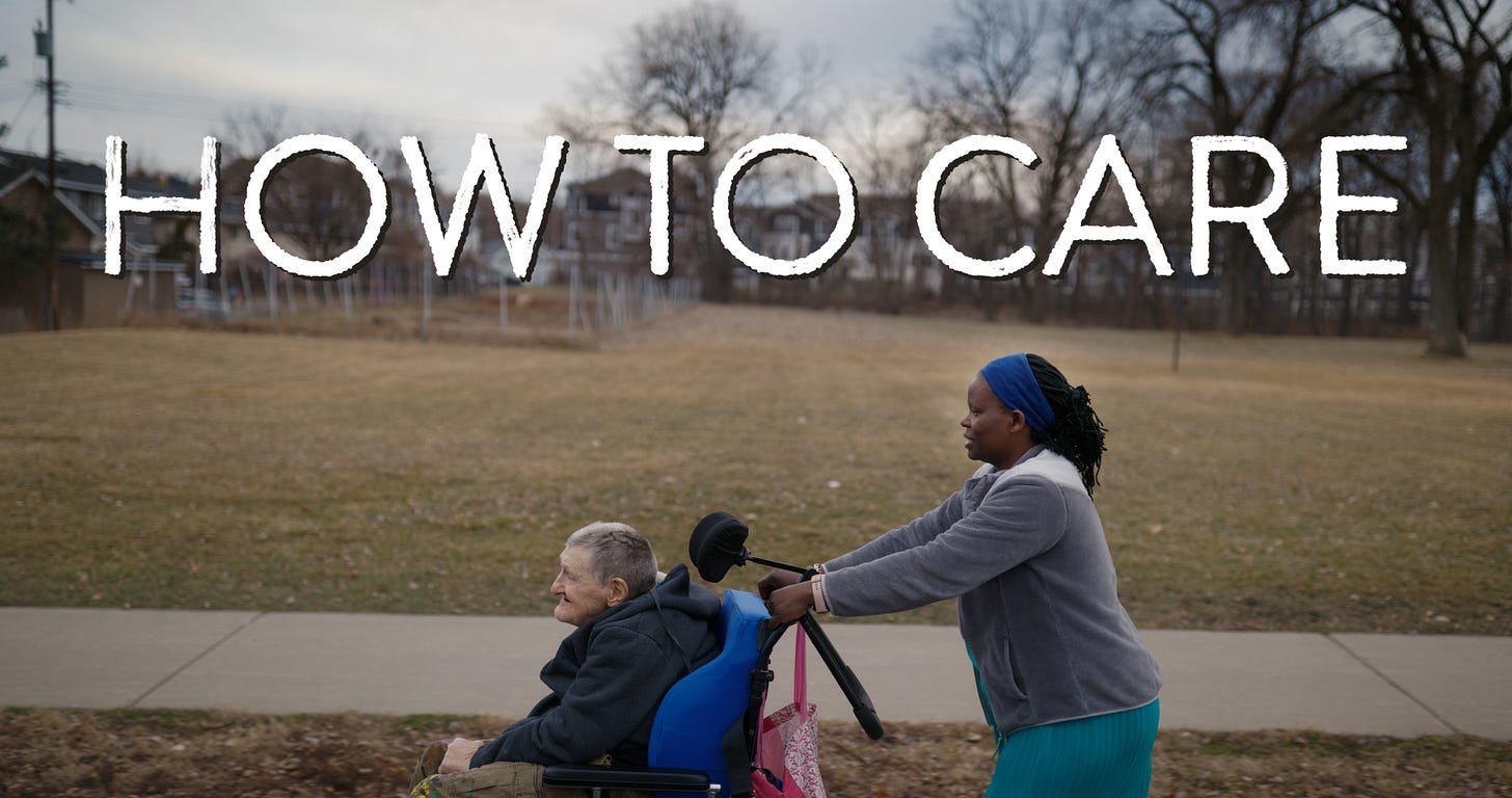 A Black care worker pushing a white disabled person in a wheelchair outside on a cloudy day. “How to care” is written in white font above their heads.