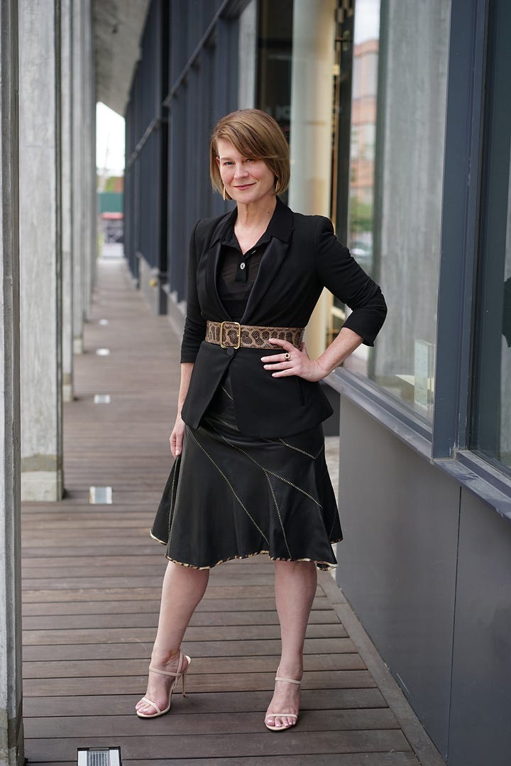 Karen Bussen stands on the street in New York City and in Paris at the Palais Royal