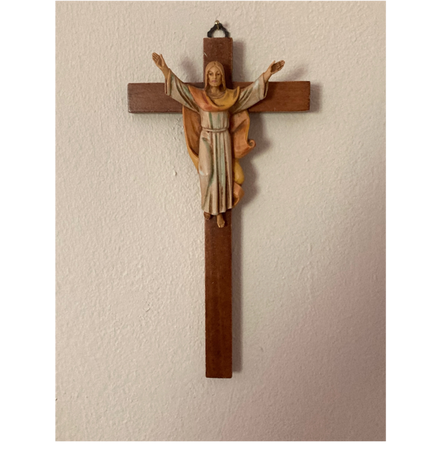 A wooden cross with a figure on it
AI-generated content may be incorrect. A wooden cross with a figure on it
AI-generated content may be incorrect.