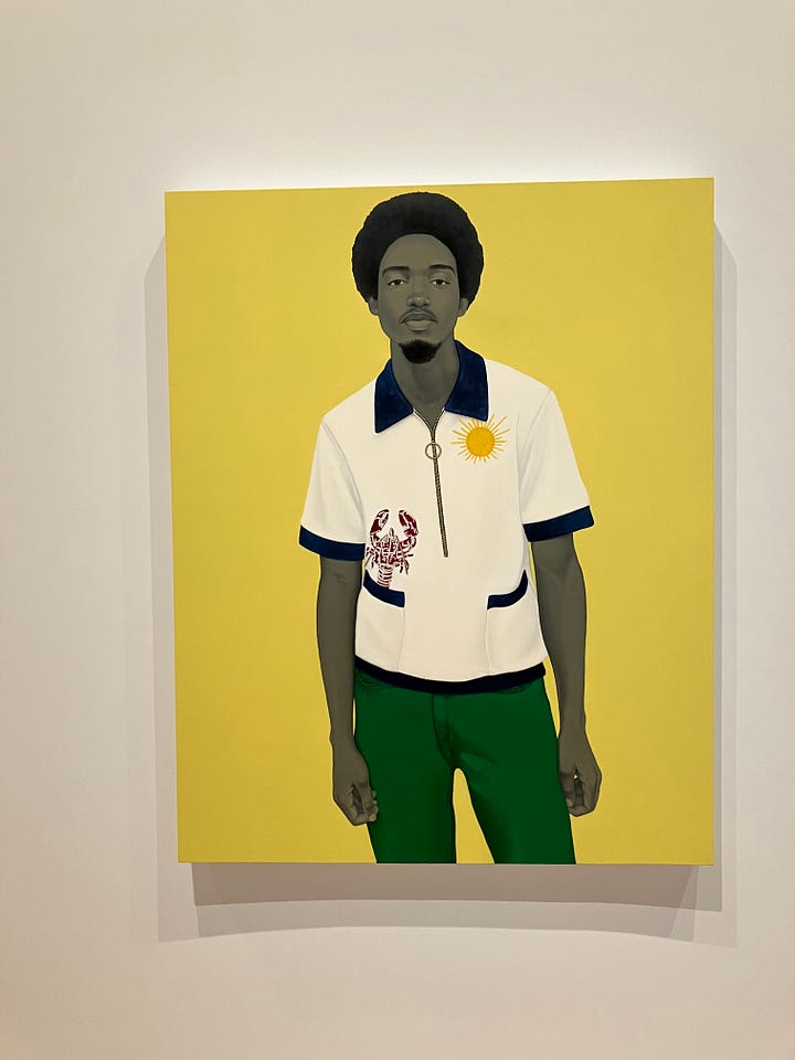 four full-length paintings of Black people in bright outfits against yellow, blue and orange backgrounds.
