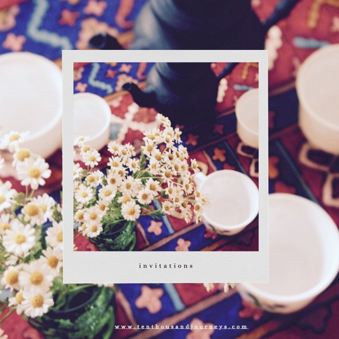 Tea pot and teacups and flowers