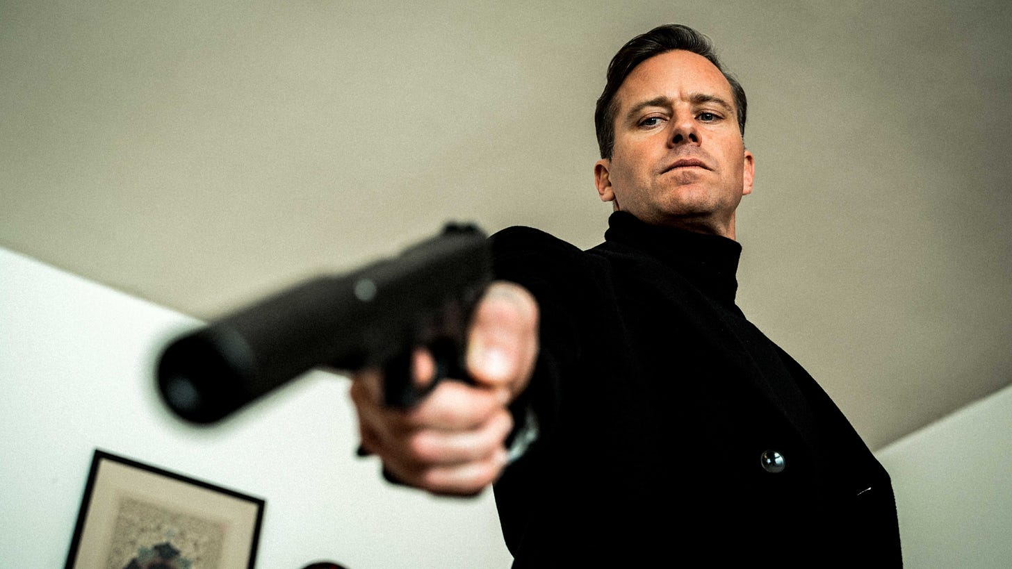 Citizen Vigilante | Still features Armie Hammer pointing a gun downwards. Citizen Vigilante | Still features Armie Hammer pointing a gun downwards.