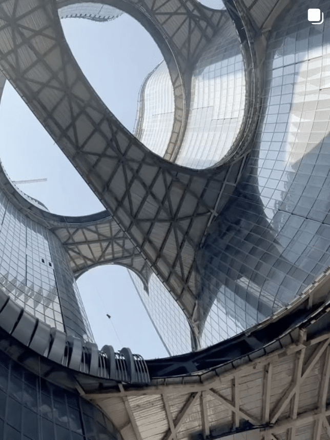 A stunning view of modern architecture, showcasing unique design elements that inspire creativity and Hunar of Zaha Hadid. What makes you irreplaceable?