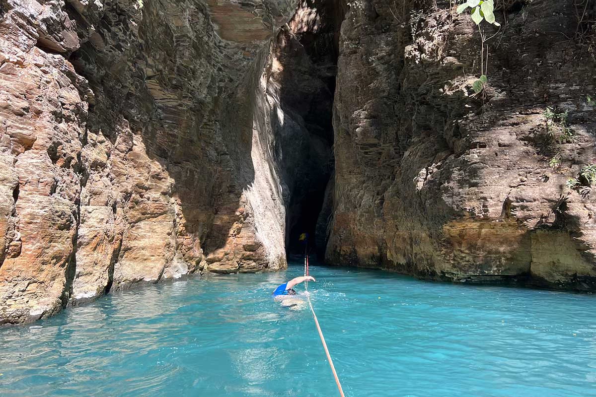 Narrow slot canyon to enter cave to La Leona waterfall Narrow slot canyon to enter cave to La Leona waterfall