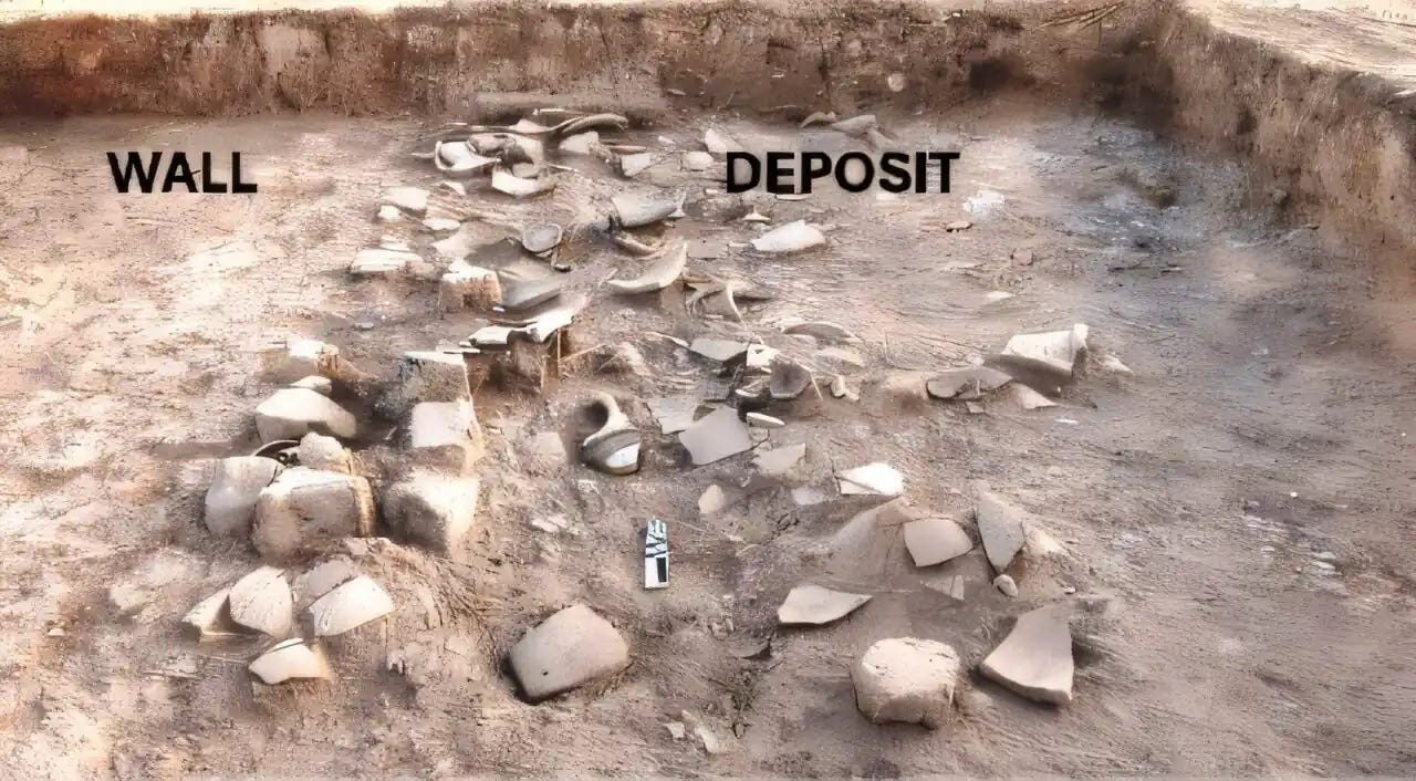 Broken pottery and other debris from a destruction layer were found preserved east of a monumental mudbrick wall Broken pottery and other debris from a destruction layer were found preserved east of a monumental mudbrick wall