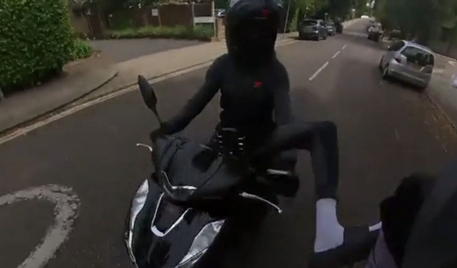 May be an image of 1 person, scooter, segway and motorcycle