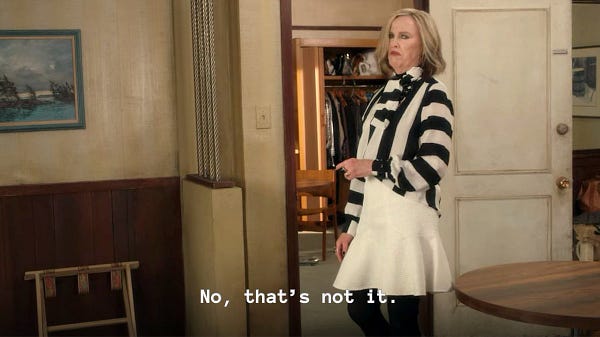 Schitt’s Creek Bobs Bagels. Moira Rose to Alexis Rose captioned “I'm feeling something. Something debilitating! You're the ill one, but I'm I'm feeling this- This-“
Alexis to Moira captioned “Maternal instinct, maybe?”
Moira responding “No, that's not it. No!”
Alexis Rose to Moira Rose smiling “Maybe.”