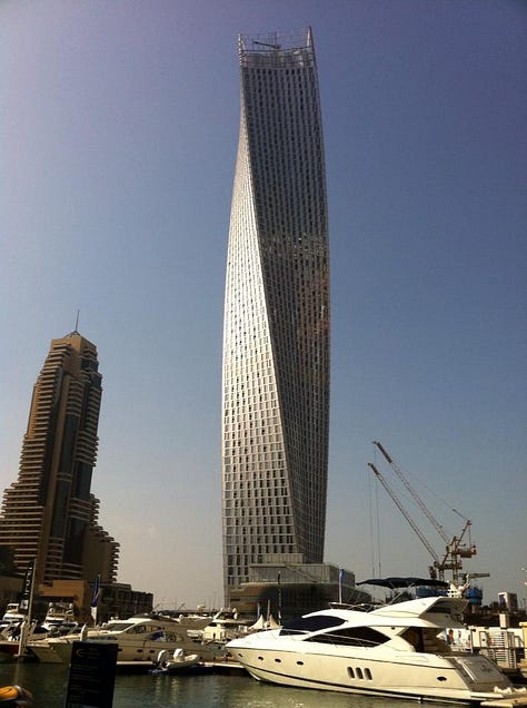 Dubai beach, resort, and twisted skyscraper building