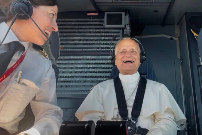 Pope Leo XIV smiling in the cockpit of an Iberia jet beside the co-pilot Pope Leo XIV smiling in the cockpit of an Iberia jet beside the co-pilot