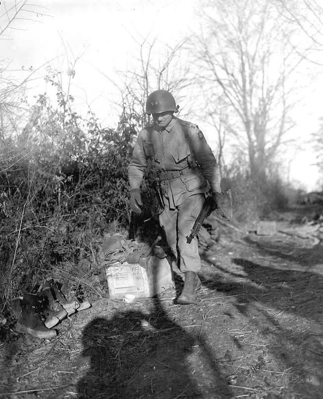 General James 'Jumpin’ Jim' Gavin, Commanding General of the 82nd Airborne Division, en route to his command post during the initial stages of the Battle of the Bulge, December 17, 1944.